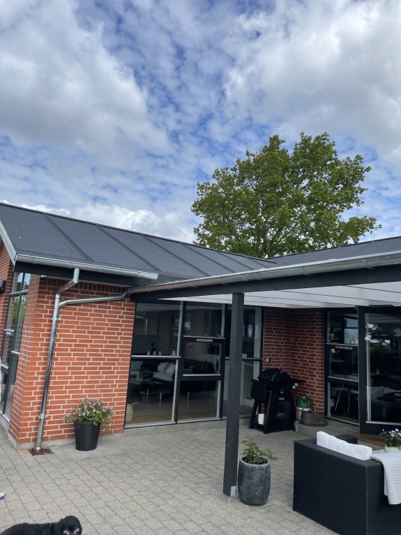 Overdækket terrasse og nyt tag fra tømrerarbejde